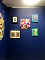 Another view of artwork curated at Peace of Time Wellness
